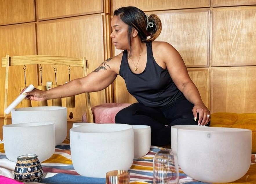 Bronte Jackson performing a sound bowl healing session